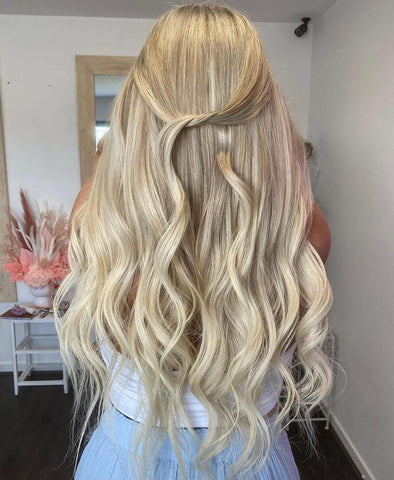 Beautiful blonde via Jadore supplier @sharlees.rayne, her client wears 150 grams of our Russian Invisible Tape Extensions